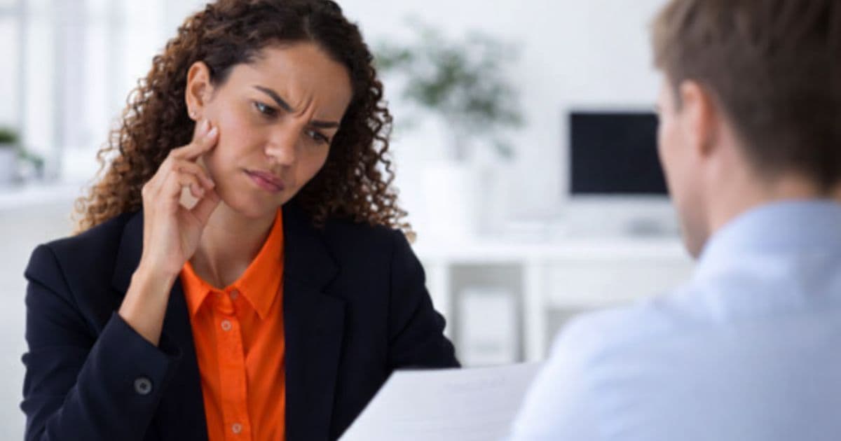 Resume review meeting with hiring team in modern office